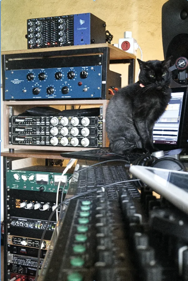Studio rack, monitor and audio equipment with Amora in the production room