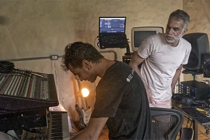 Two people working together inside the Dosel studio
